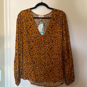 Brand new leopard print size large button top